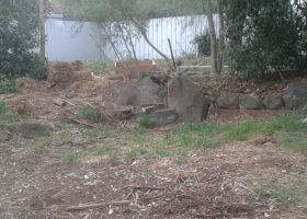 BEFORE - Anne's back yard was not a useful space for entertaining guests.